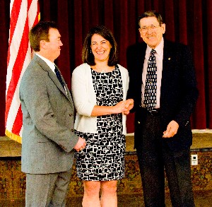 As the chapter continues its 55th anniversary celebration in June, Richard Besselman (l), chapter president, and Dawn Way (c), chapter vice president for programs, present a pin and certificate of appreciation to past president Harry Walther, who served from 1978-1979.